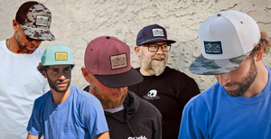 Five men wearing different hats with visible brand logos against a neutral background